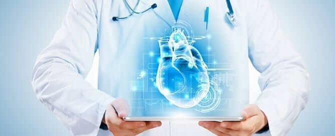 Doctor with digital heart blueprint