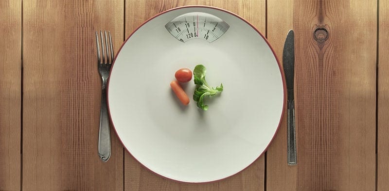 Plate Scale with Small Vegetables on it