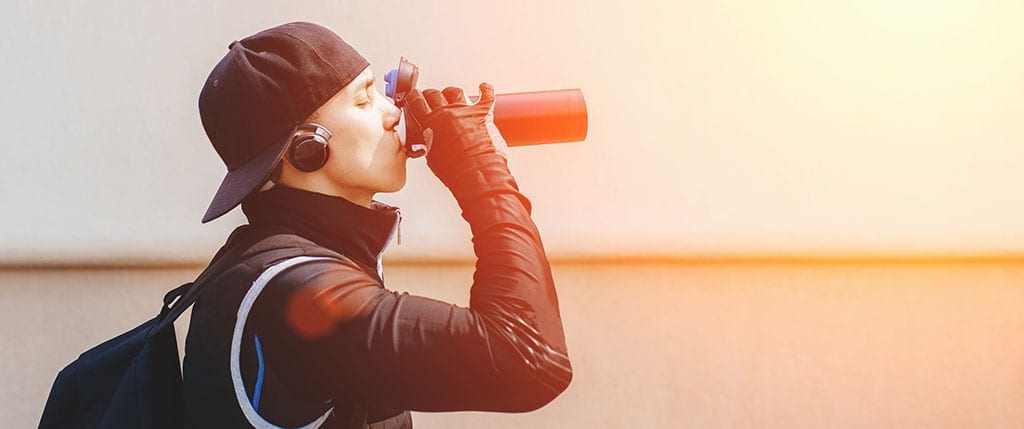 Guy Drinking a Sports Drink