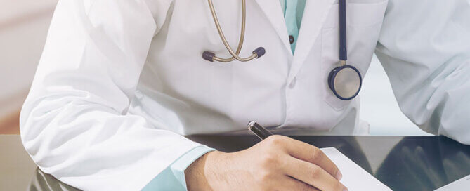 Doctor Writing on Paper