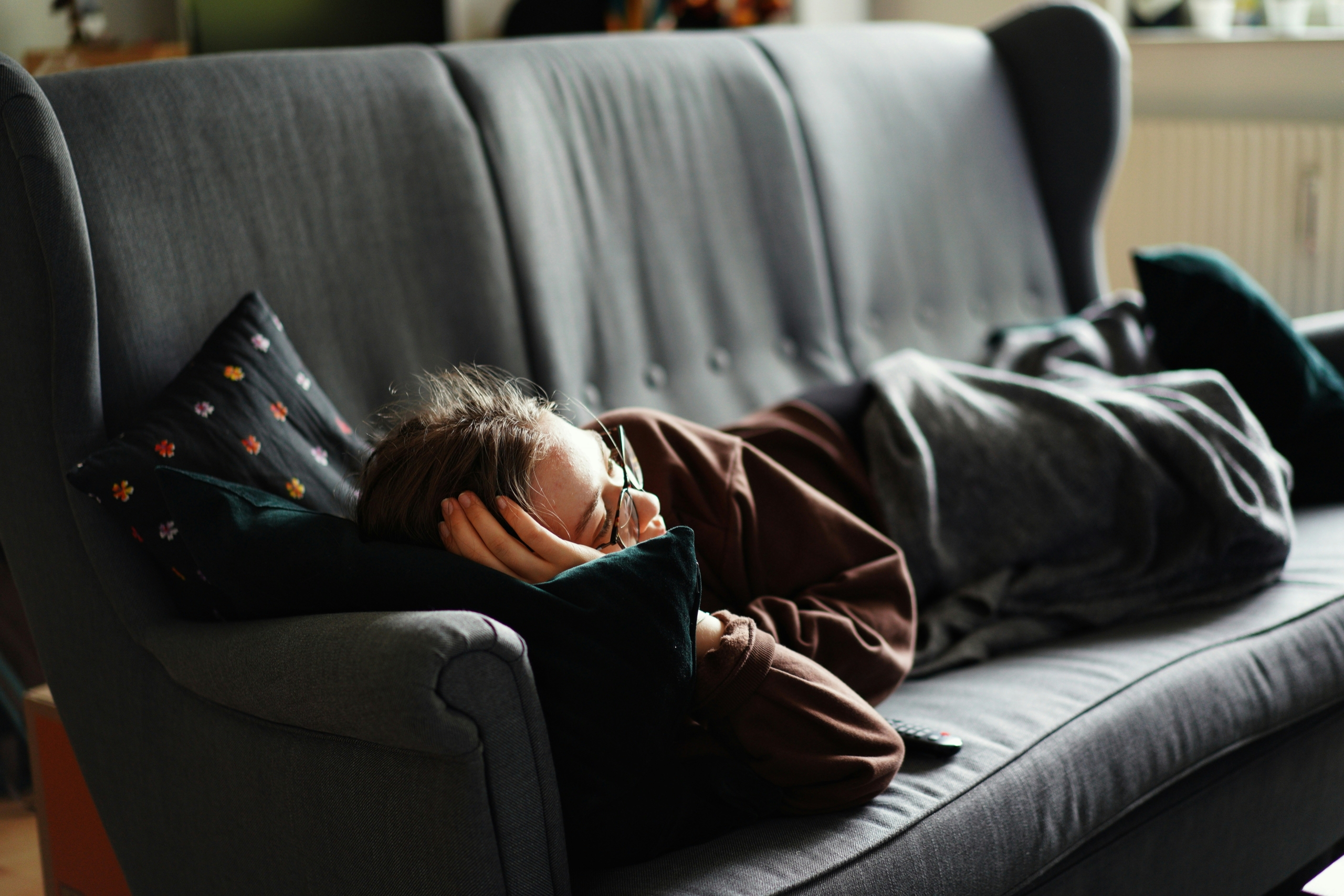 Teenager relaxing on couch